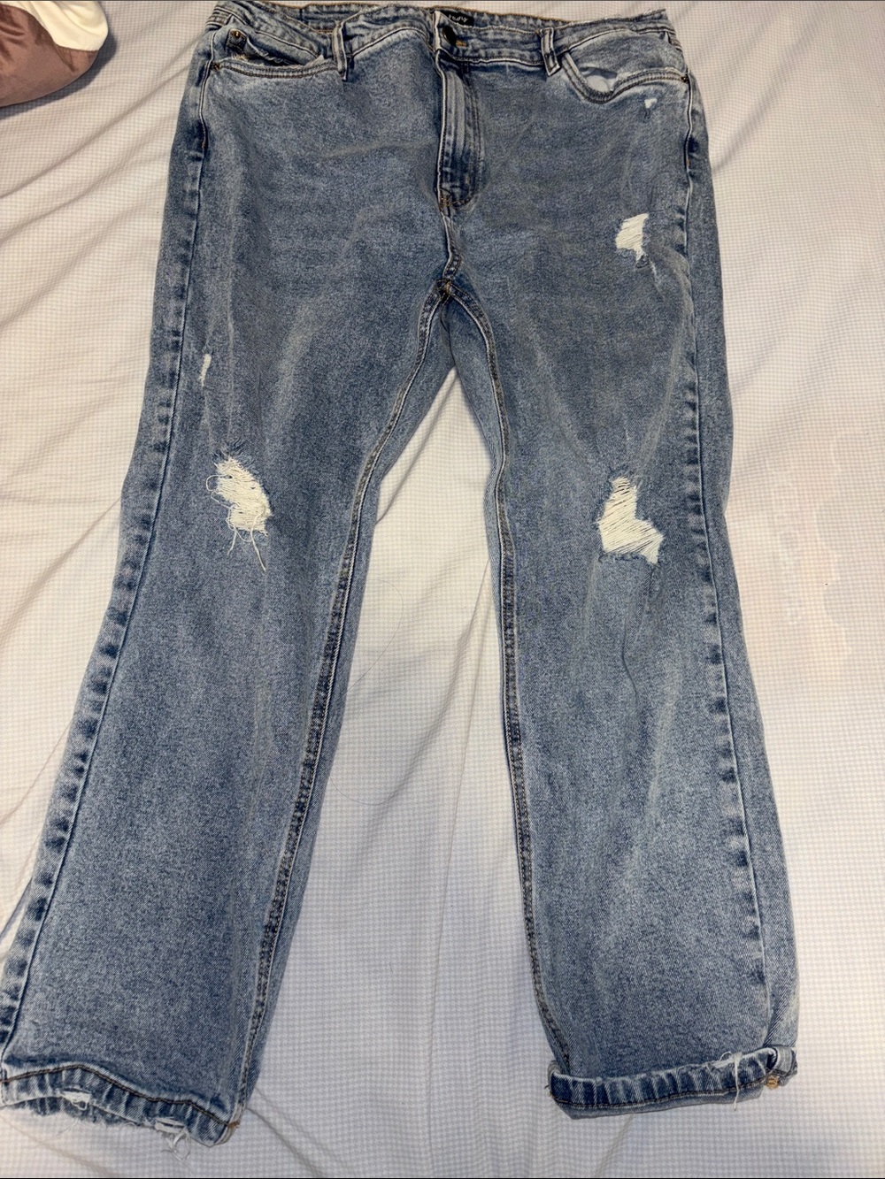 Women’s Distressed Light Blue Denim Jeans